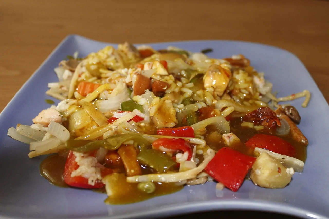 Riz sauté : comment réaliser ce plat emblématique de la cuisine asiatique chez vous ?